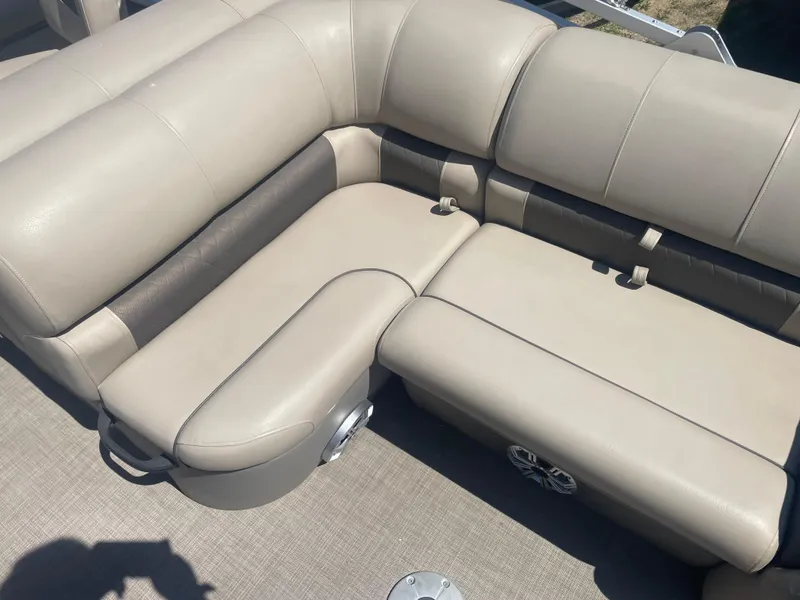 Slide: The Image of 2023 Sun Tracker SportFish 22 XP3 beige leather seating area. - 10
