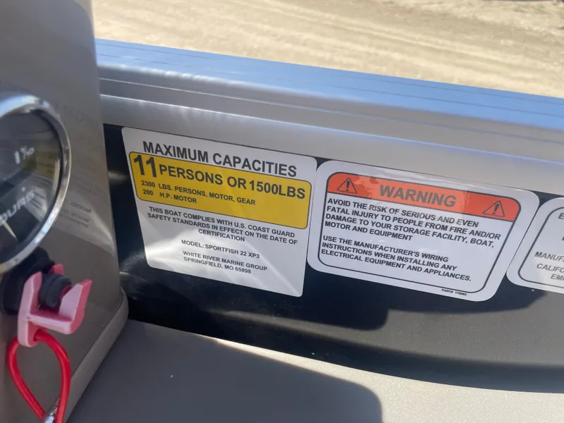 Slide: The Image of 2023 Sun Tracker SportFish 22 XP3 maximum capacity warning label - 9