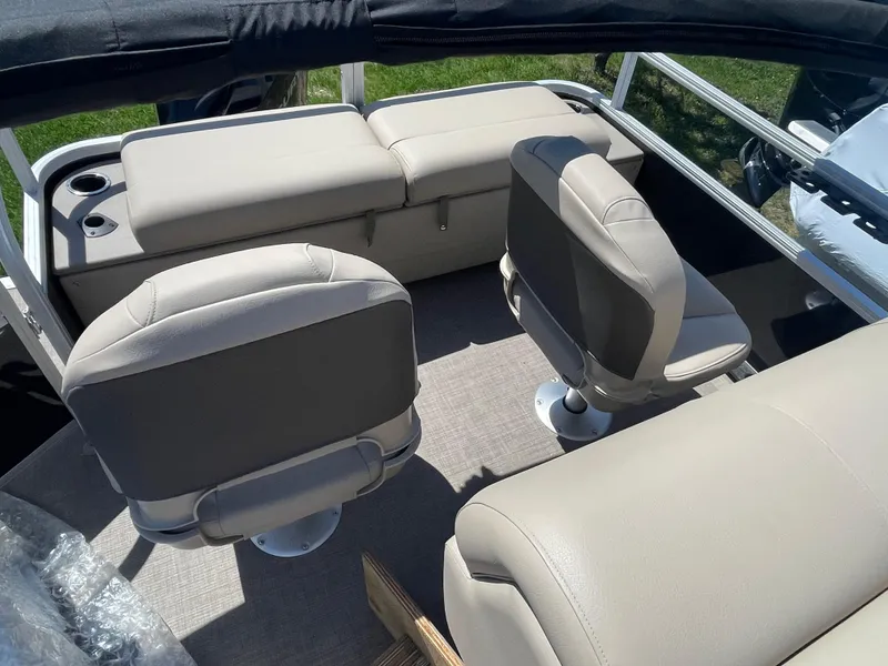Slide: The Image of 2022 Sun Tracker SportFish 22 XP3 boat interior with beige seating. - 14