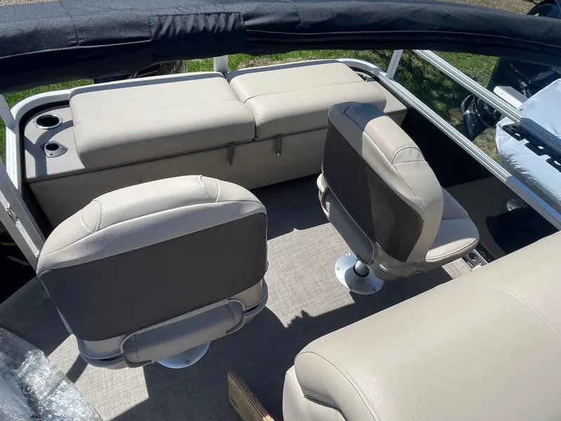 Slide: The Image of 2022 Sun Tracker SportFish 22 XP3 boat interior with beige seating. - 15