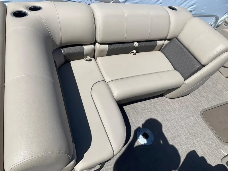 Slide: The Image of 2022 Sun Tracker SportFish 22 XP3 boat interior seating with cup holders. - 20