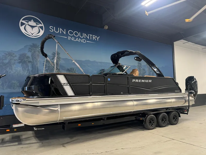 The Image of 2025 Premier 270 Super Sport RF pontoon boat displayed indoors. - 1