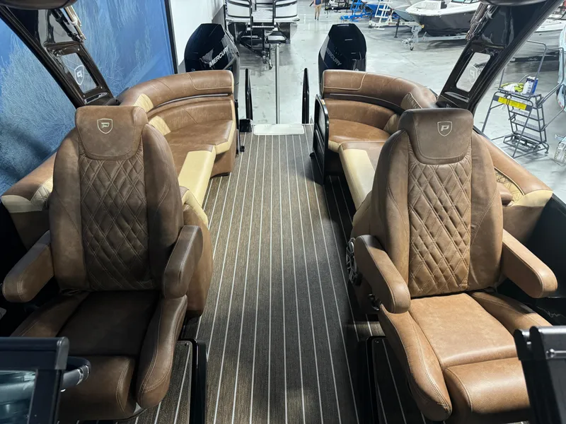 Slide: The Image of 2025 Premier 270 Super Sport RF boat interior with luxurious brown seating. - 10