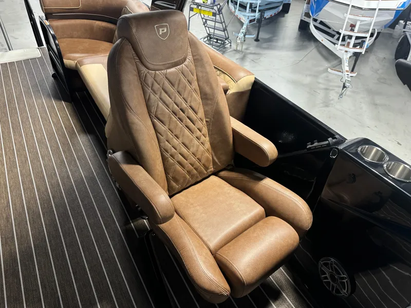 Slide: The Image of Luxurious brown seat in 2025 Premier 270 Super Sport RF boat interior. - 11