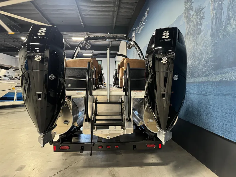 Slide: The Image of 2025 Premier 270 Super Sport RF boat with dual engines in showroom. - 4