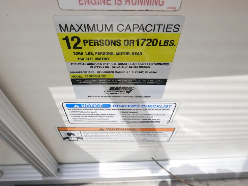 Slide: The Image of 2007 Sedona L23 capacity label: 12 persons or 1720 lbs, 150 HP motor limit. - 11
