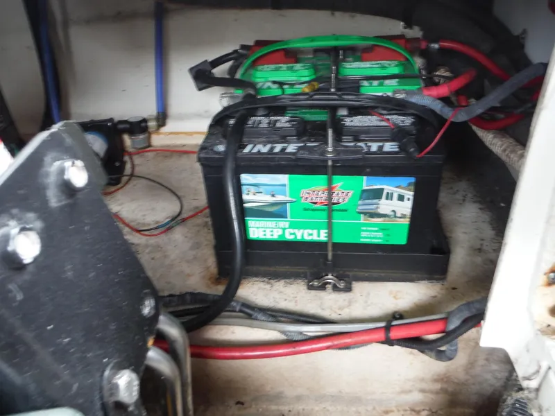 Slide: The Image of Battery compartment of a 2007 Sea Ray 240 Sundeck boat with Interstate deep cycle battery. - 19