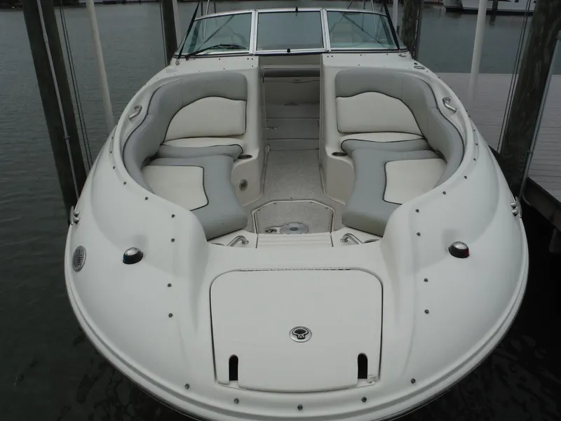 Slide: The Image of 2007 Sea Ray 240 Sundeck boat with spacious seating docked in marina. - 5