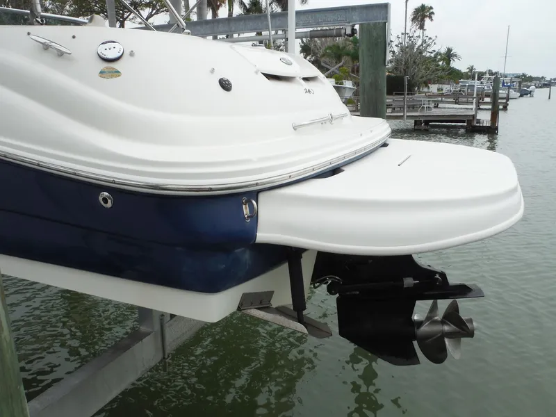 Slide: The Image of 2007 Sea Ray 240 Sundeck boat stern view with outboard motor. - 3