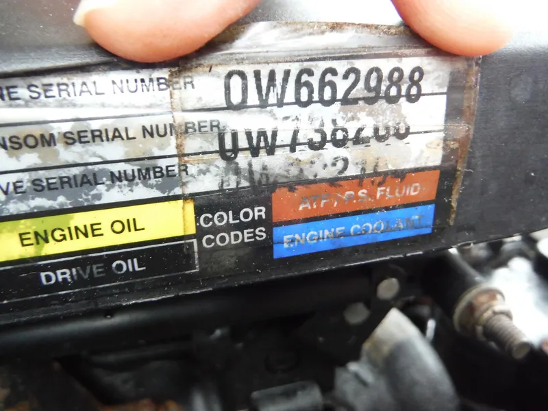 Slide: The Image of 2007 Sea Ray 240 Sundeck engine serial number and color codes label. - 17