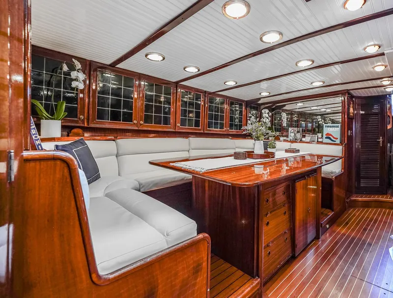 Slide: The Image of Luxurious interior of 1929 Lyman-Morse Staysail Schooner with polished wood and elegant seating. - 33
