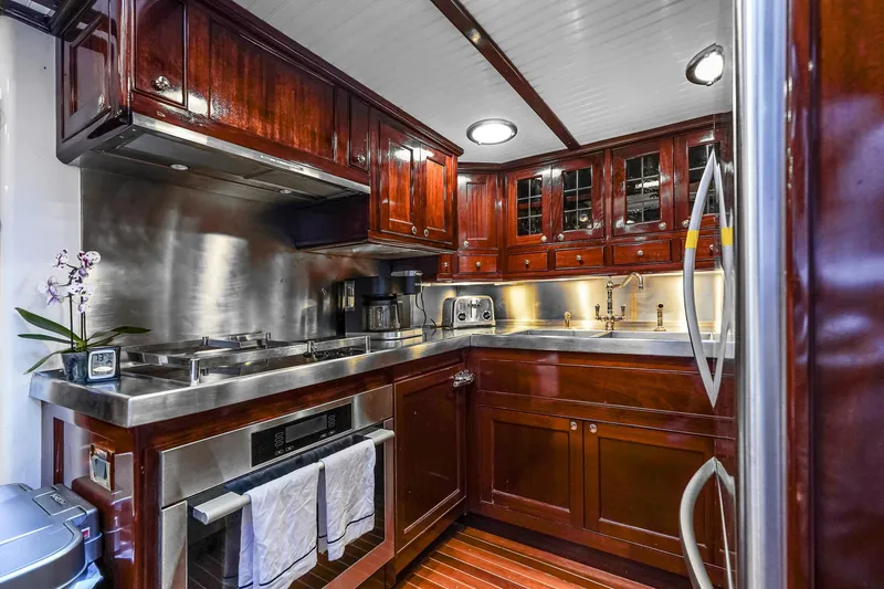 Slide: The Image of Luxurious wooden kitchen interior on 1929 Lyman-Morse Staysail Schooner yacht. - 35
