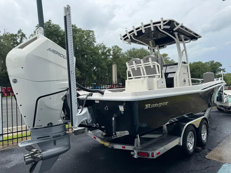 Slide: The Image of 2024 Ranger 2510 boat on trailer with Mercury outboard motor. - 3