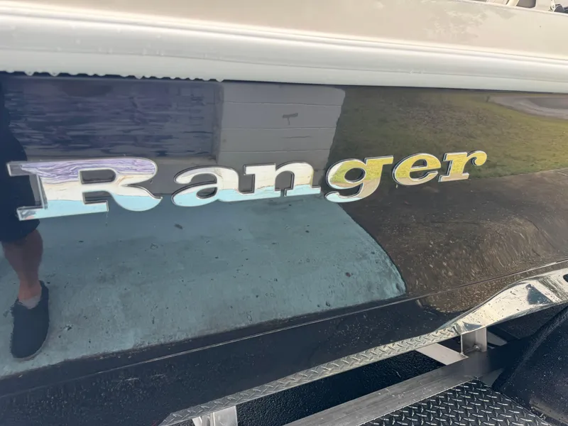 Slide: The Image of 2024 Ranger 2510 boat model nameplate on black hull. - 5