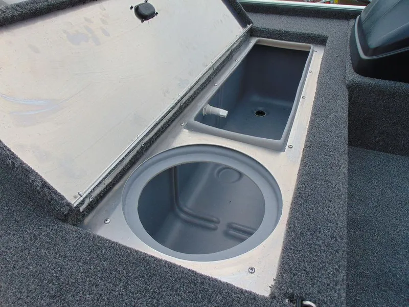 Slide: The Image of 2024 Crestliner 1600 Storm boat storage compartments. - 8