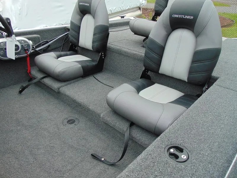 Slide: The Image of 2024 Crestliner 1600 Storm boat interior with two cushioned seats. - 9