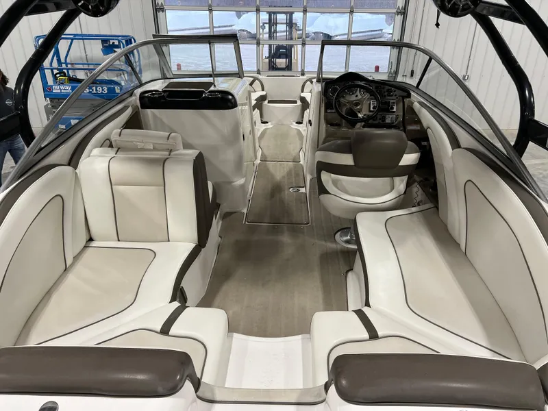 Slide: The Image of 2013 Yamaha Boats 242 Limited S interior with spacious seating and modern design. - 6