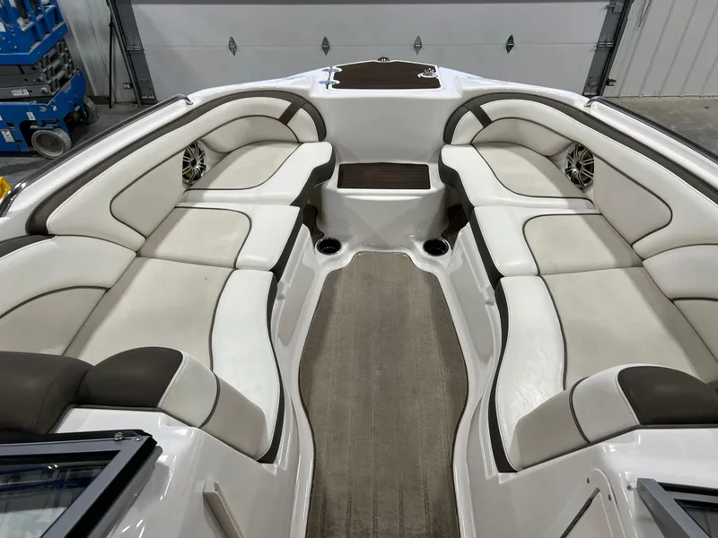 Slide: The Image of 2013 Yamaha Boats 242 Limited S interior with spacious seating and elegant design. - 8