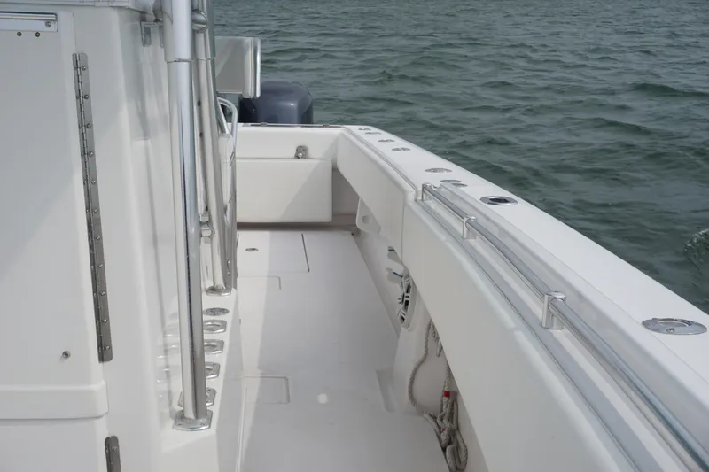 Slide: The Image of 2006 Contender 36 Cuddy boat deck with ocean view. - 2