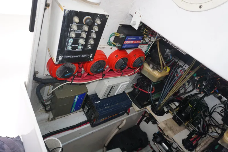 Slide: The Image of Electrical system and wiring inside a 2006 Contender 36 Cuddy boat. - 24