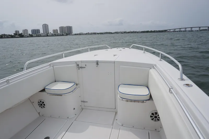 Slide: The Image of 2006 Contender 36 Cuddy boat interior with ocean and city skyline. - 4