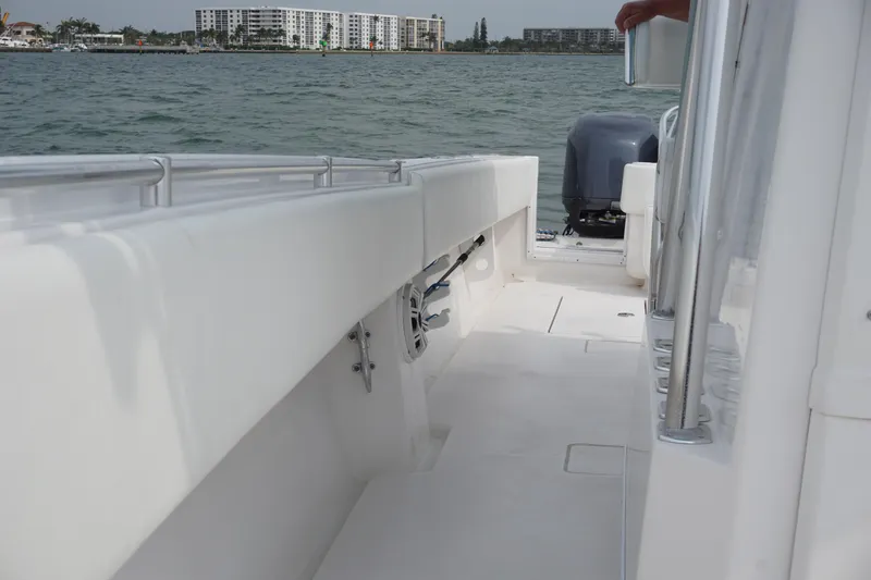 Slide: The Image of 2006 Contender 36 Cuddy boat interior with ocean view. - 5
