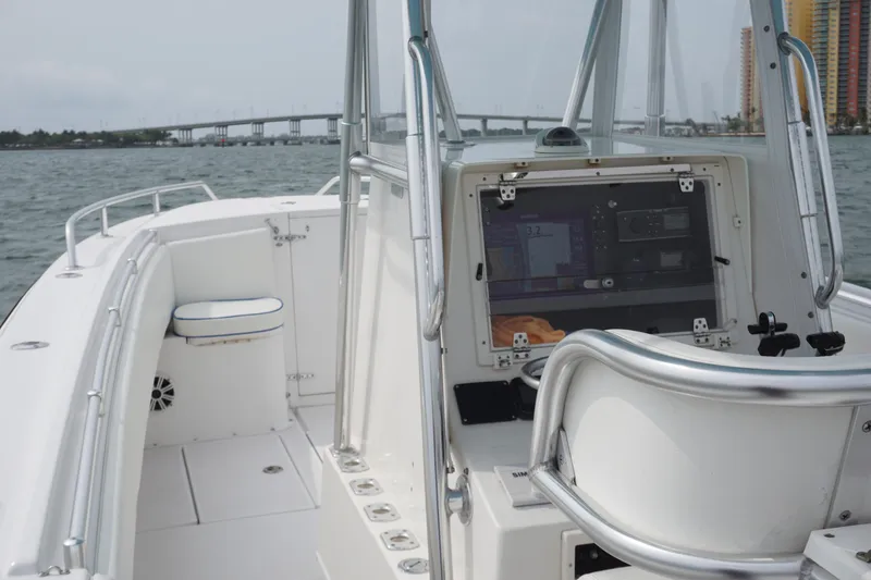 Slide: The Image of 2006 Contender 36 Cuddy boat with bridge view in background. - 6