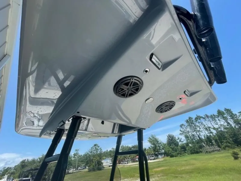 Slide: The Image of 2020 ShearWater 270 Carolina Flare boat underside with speakers and ladder. - 14