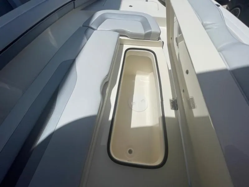 Slide: The Image of 2020 ShearWater 270 Carolina Flare boat interior with storage compartment. - 24