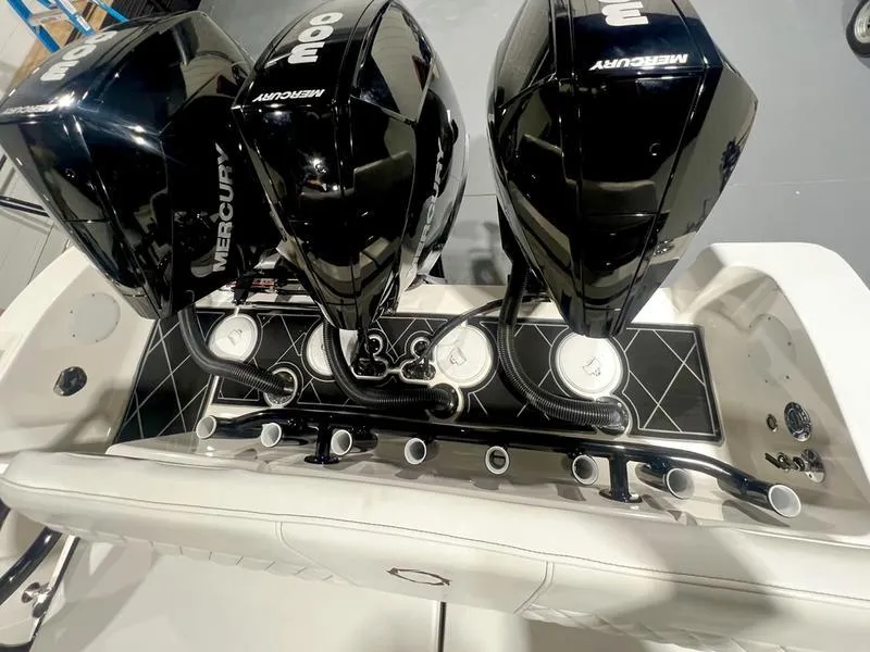 Slide: The Image of 2022 Fountain 34 TE boat with triple Mercury 300 outboard engines. - 11