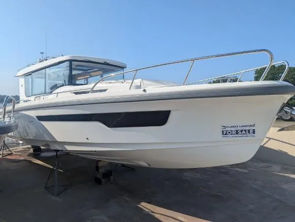 The Image of 2024 Nimbus C11 boat for sale, displayed on a stand, clear sky background. - 0
