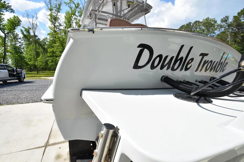 Slide: The Image of Custom Carolina 28 Cape Lookout boat, 2007 model, named "Double Trouble" on a sunny day. - 12