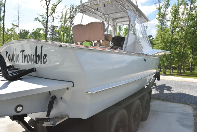 Slide: The Image of Custom Carolina 28 Cape Lookout boat, 2007 model, repowered in 2019, named "Double Trouble." - 13