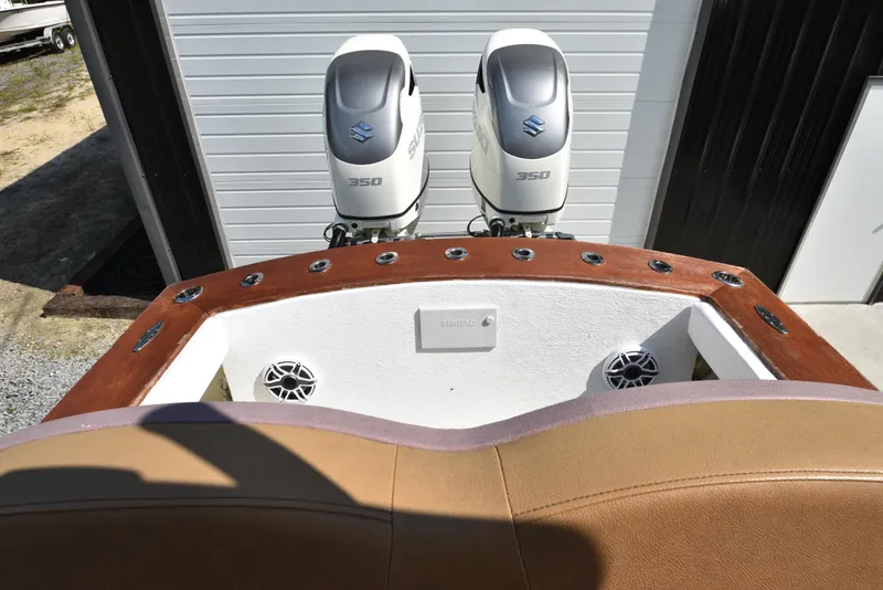 Slide: The Image of Custom Carolina 28 Cape Lookout boat with twin Suzuki 350 engines, 2019 repower. - 24