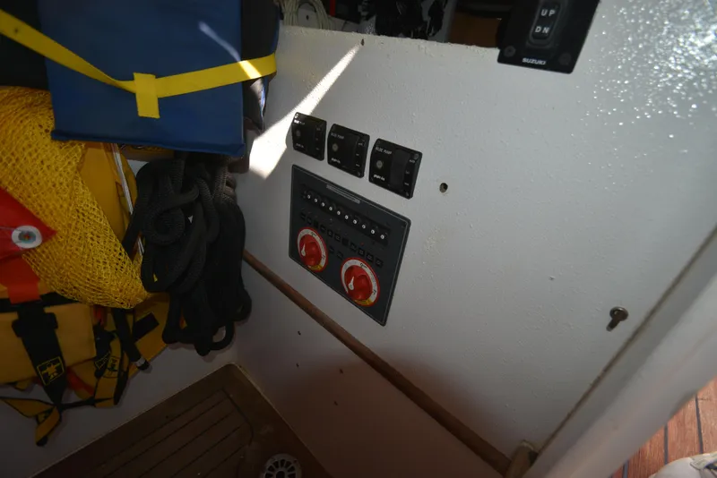 Slide: The Image of Control panel and safety gear on 2007 Custom Carolina 28 Cape Lookout boat. - 38