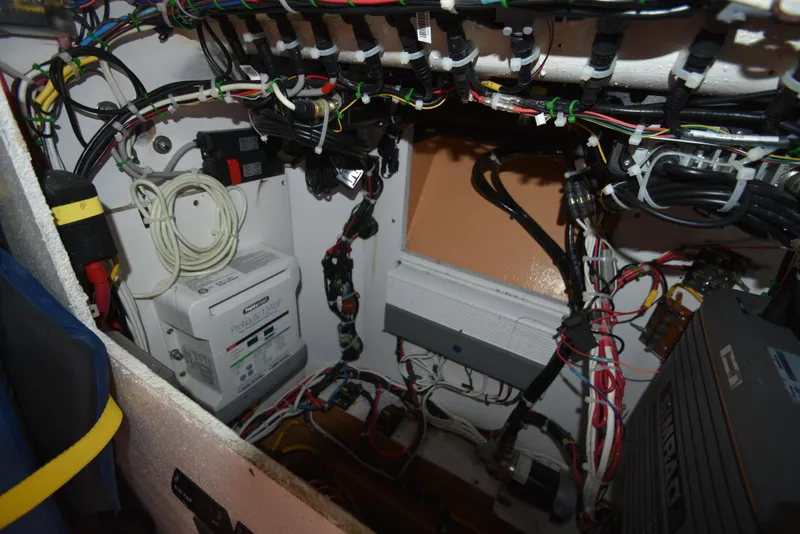 Slide: The Image of Electrical wiring and equipment inside a 2007 Custom Carolina 28 Cape Lookout boat. - 39