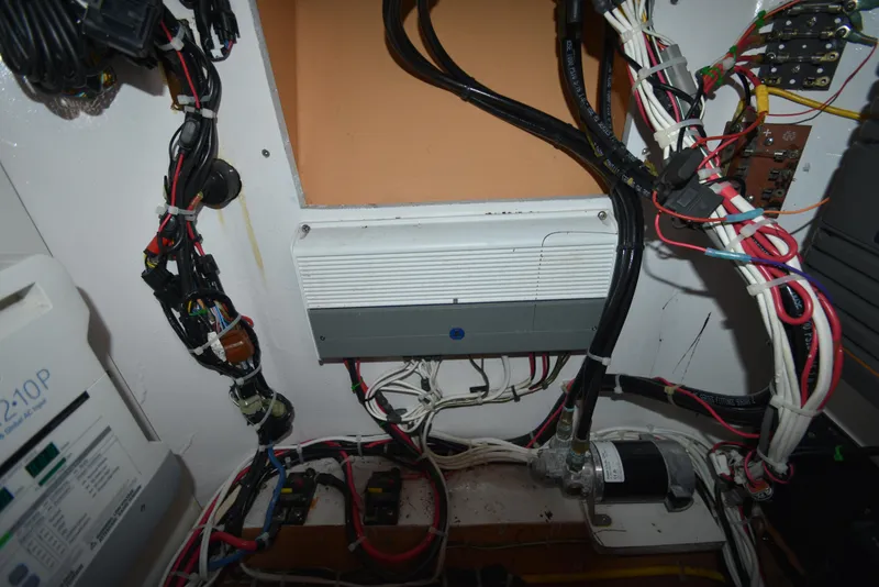 Slide: The Image of Electrical wiring and components inside a 2007 Custom Carolina 28 Cape Lookout boat. - 40