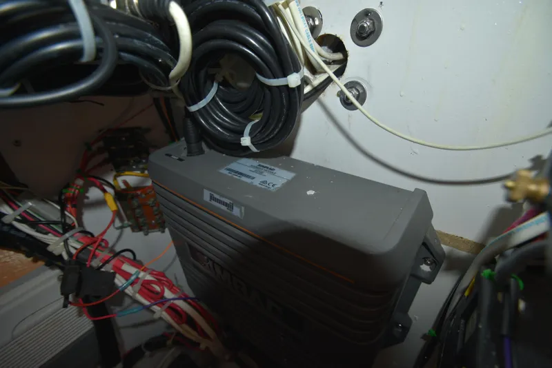 Slide: The Image of Electrical wiring and equipment inside a 2007 Custom Carolina 28 Cape Lookout boat. - 42