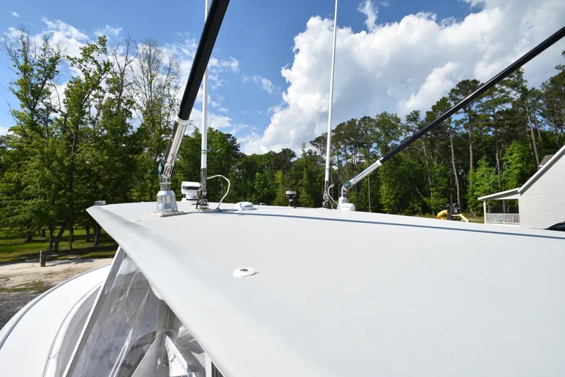 Slide: The Image of Custom Carolina 28 Cape Lookout boat, 2007 model, repowered in 2019, docked outdoors. - 46
