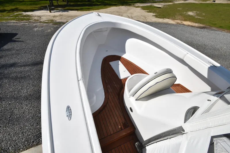 Slide: The Image of Custom Carolina 28 Cape Lookout boat, 2007 model, featuring teak deck and white seating. - 47