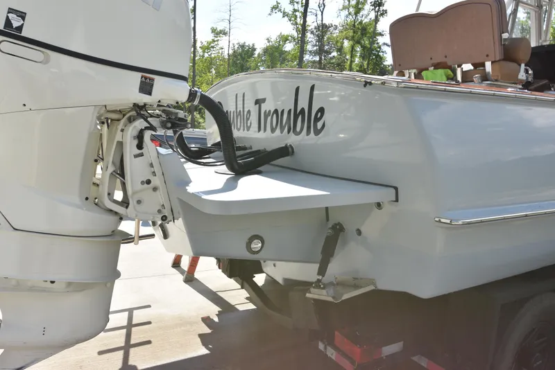 Slide: The Image of Custom Carolina 28 Cape Lookout boat, 2007 model, repowered in 2019, with outboard motor. - 7