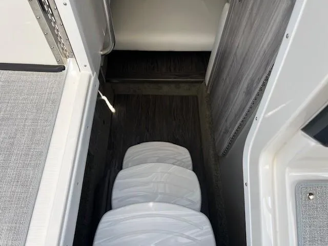 Slide: The Image of Interior seating area of 2025 Formula 330 Crossover Bowrider I/O boat. - 13