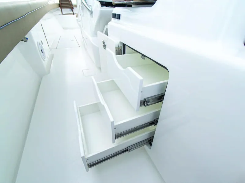 Slide: The Image of Open storage drawers on the 2025 Valhalla Boatworks V-41 boat. - 12