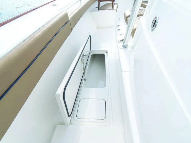 Slide: The Image of 2025 Valhalla Boatworks V-41 storage compartment with open hatch. - 22