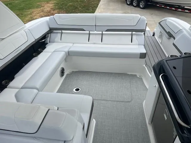 Slide: The Image of 2025 Formula 350 Crossover Bowrider I/O interior seating area with modern design. - 14