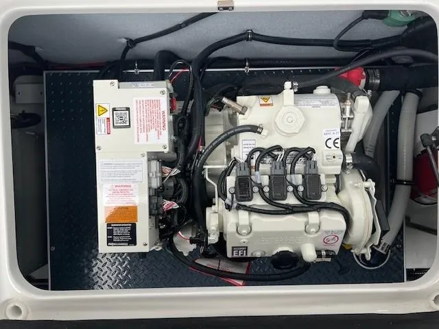 Slide: The Image of Engine compartment of a 2025 Formula 350 Crossover Bowrider I/O boat. - 22