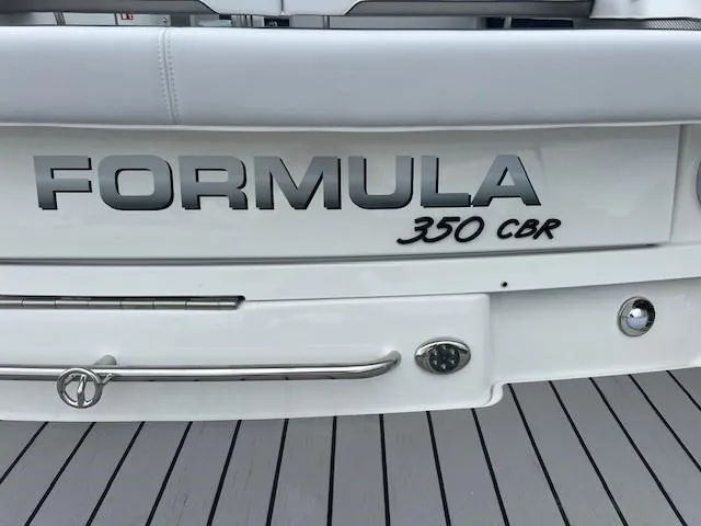 Slide: The Image of 2025 Formula 350 Crossover Bowrider I/O boat rear view. - 7