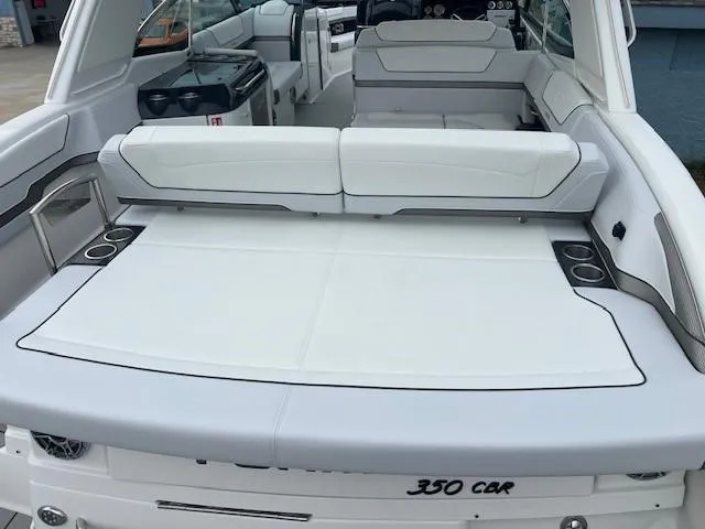 Slide: The Image of 2025 Formula 350 Crossover Bowrider I/O, spacious rear seating and sunbathing area. - 8