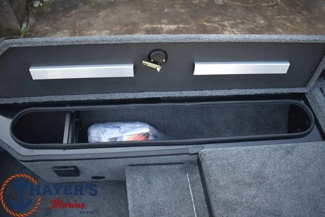 Slide: The Image of 2024 Ranger RT178 storage compartment with Thayer's Marine logo. - 14