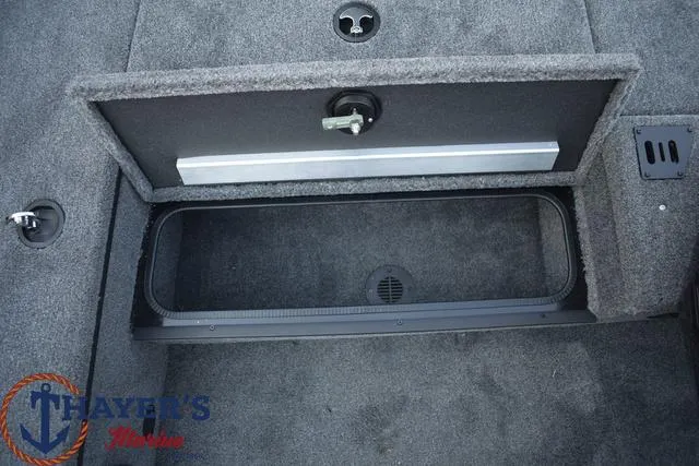 Slide: The Image of 2024 Ranger RT178 storage compartment with carpeted interior. - 18